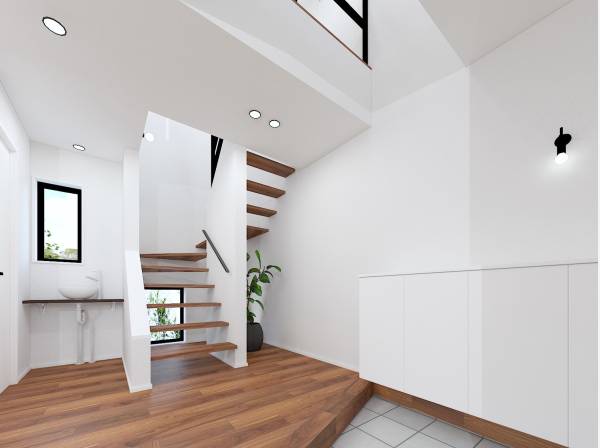 玄関上部は吹き抜けで明るく開放的