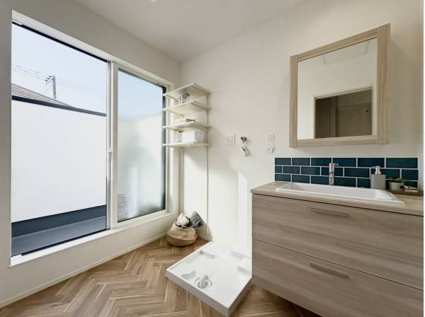 バルコニーにそのまま繋がる家事動線の良い洗面化粧室