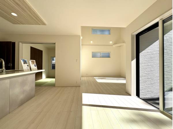 開放的な1階LDK、リビングは吹き抜け空間