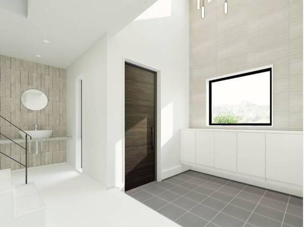 吹抜天井で明るい雰囲気が広がる玄関ホール※完成イメージ